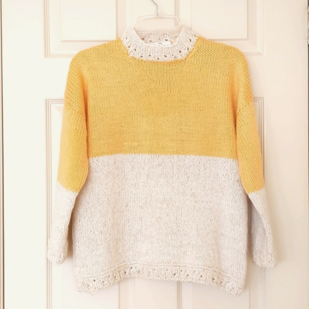 NWOT. Woman's Two colors sweater with crochet trim and sparkling.